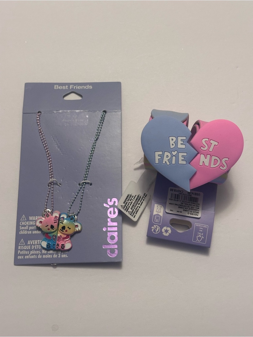 Set of 2 “Best Friends” jewelry. One set necklaces and one set snap bracelets.